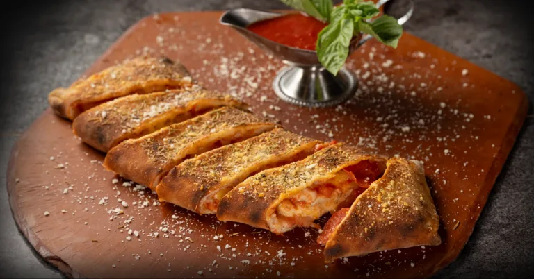 Stromboli stuffed with pepperoni and sausage at Anthony’s Coal Fired Pizza, perfect for pizza lovers who want a bold Italian starter.