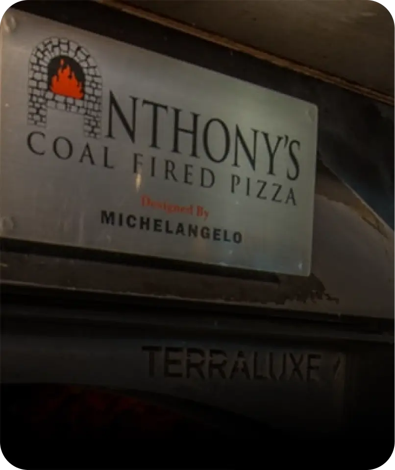 Exterior of Anthony’s Coal Fired Pizza location in Fort Lauderdale South, showcasing the iconic signage and building details.