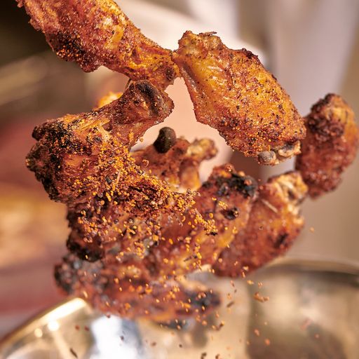 Chicken wings being fried at Anthony’s Coal Fired Pizza & Wings.